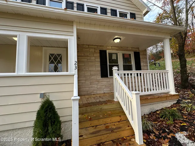 a view of a house with a porch