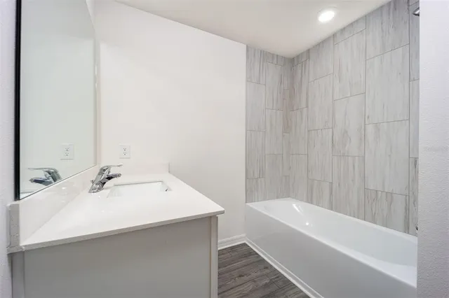 a view of an house with backyard and porch