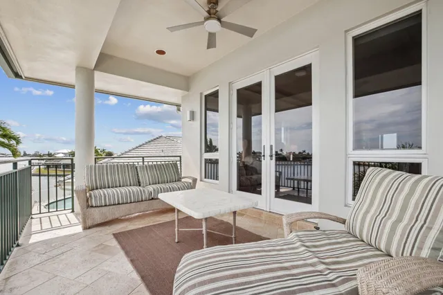 a view of a terrace with sitting area