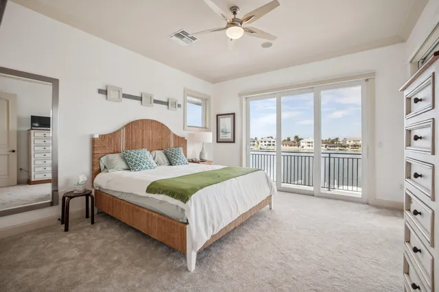 a bathroom with a sink toilet and a mirror