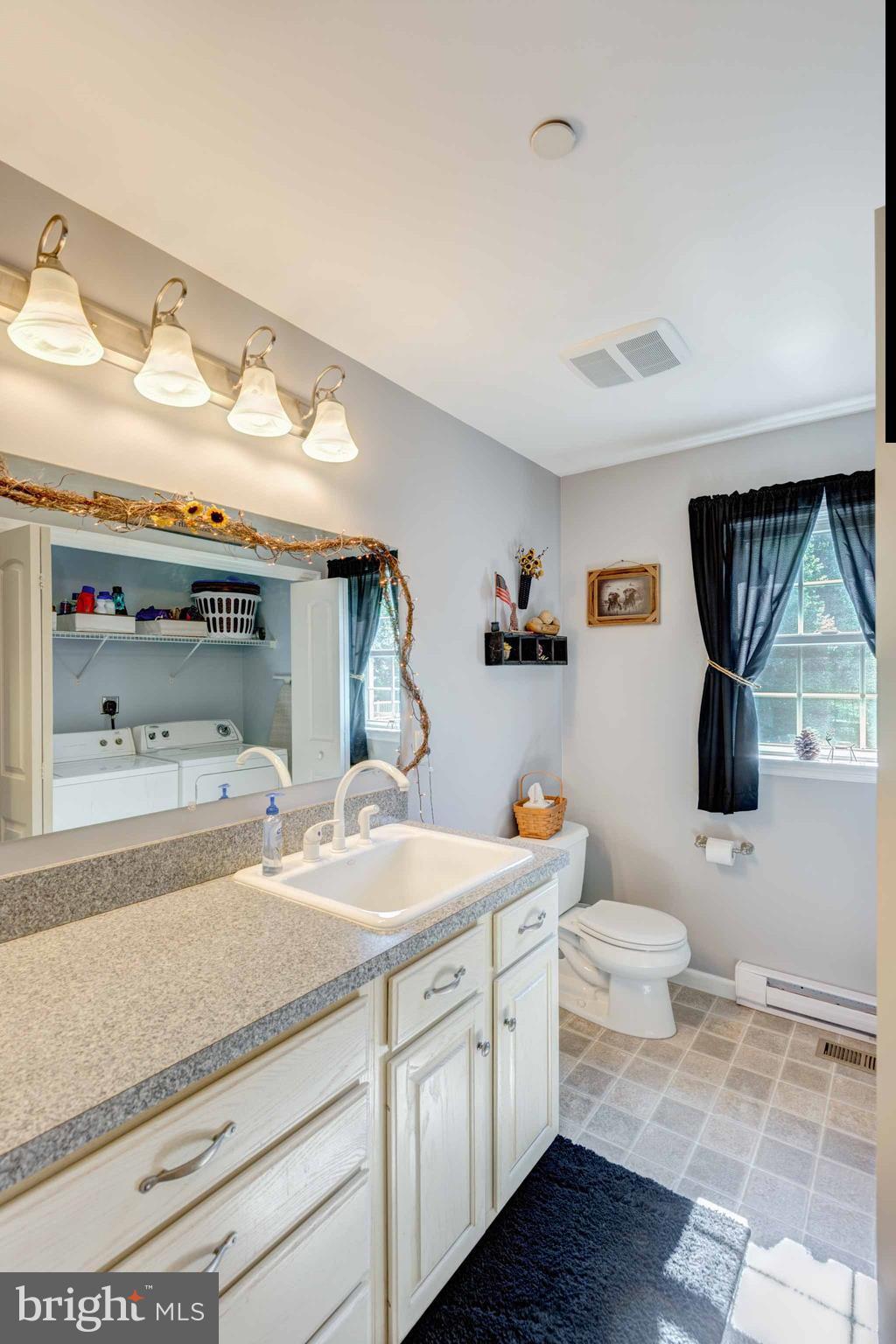 3973 North Stone Road Taneytown, MD 21787 - Photo 22 of 30 Main Level 1/2 Bath and Laundry