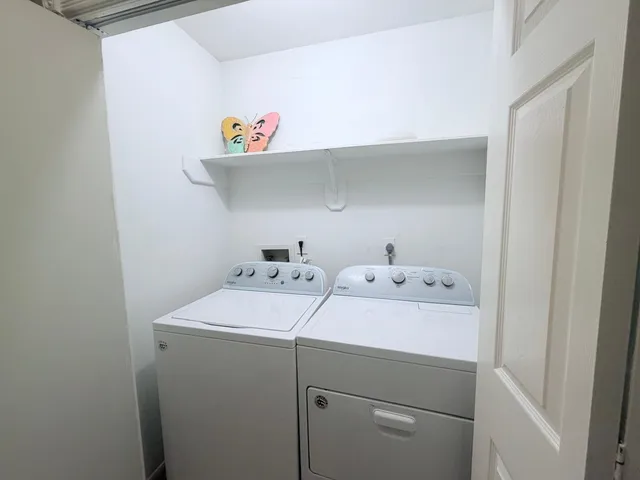 a childrens park with lots of swings and slides