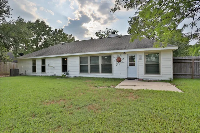 a view of a wrought iron fences in front of house