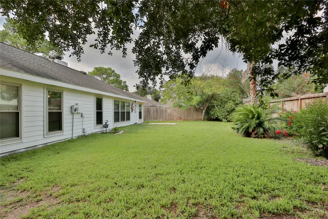 a view of a green field with clear sky