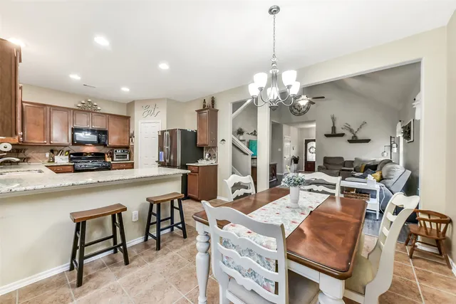 a view of a dining room kitchen and a window
