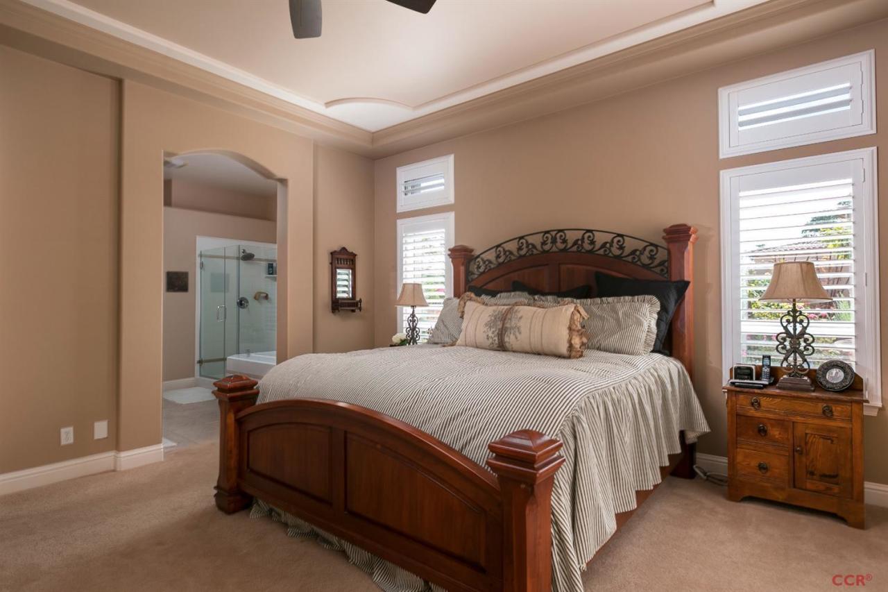 6300 San Gabriel Road Atascadero, CA 93422 - Photo 18 of 25 a bedroom with a bed and a window