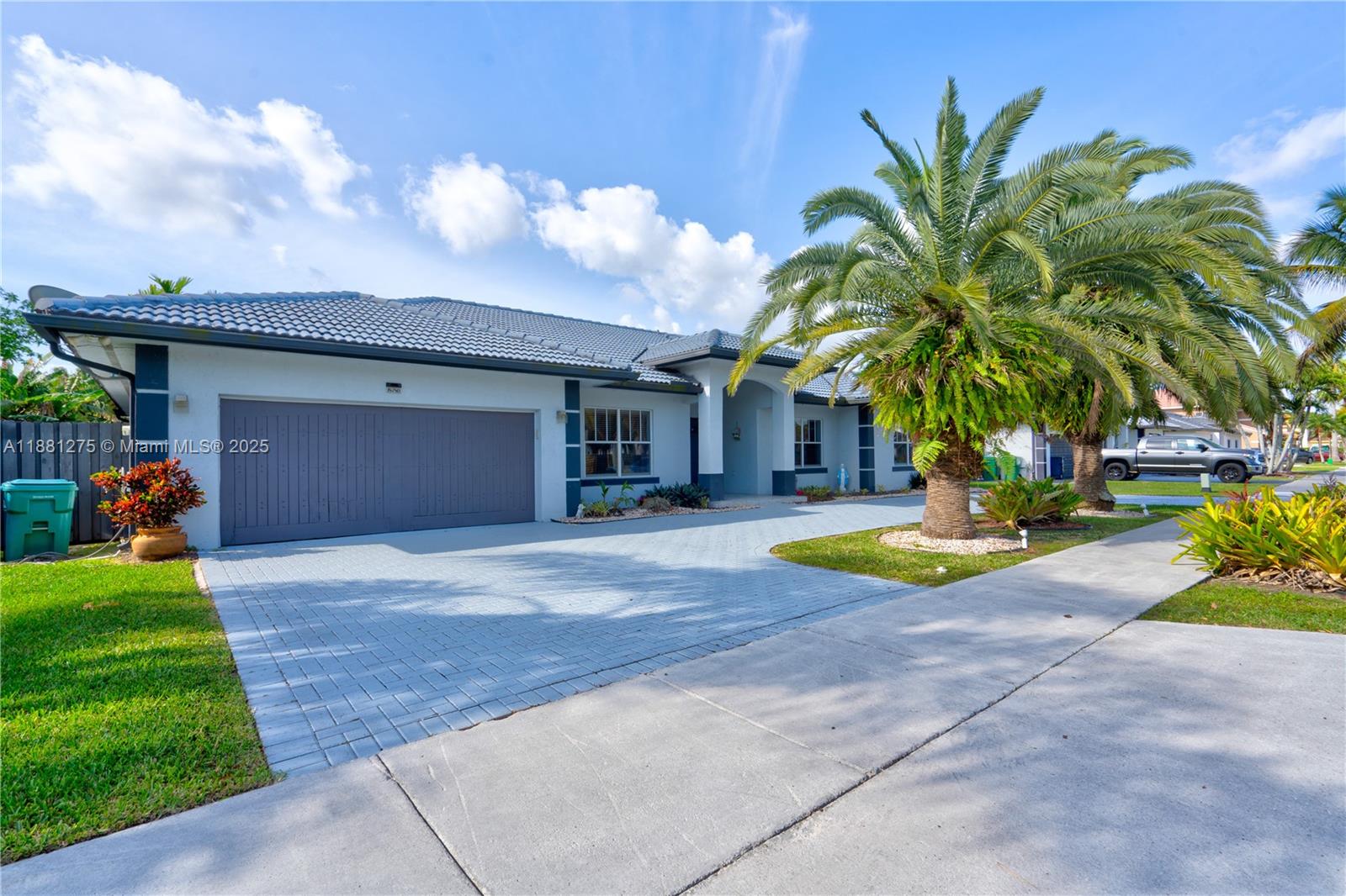 15750 Southwest 45th Street Miami, FL 33185 - Photo 3 of 45 a view of a house with swimming pool and a yard