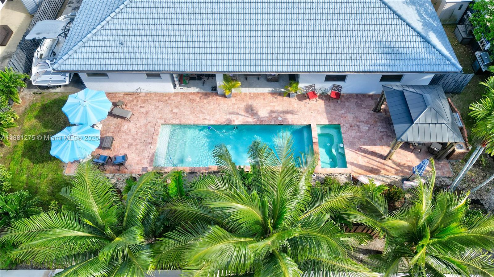 15750 Southwest 45th Street Miami, FL 33185 - Photo 34 of 45 an aerial view of a house with a yard and potted plants