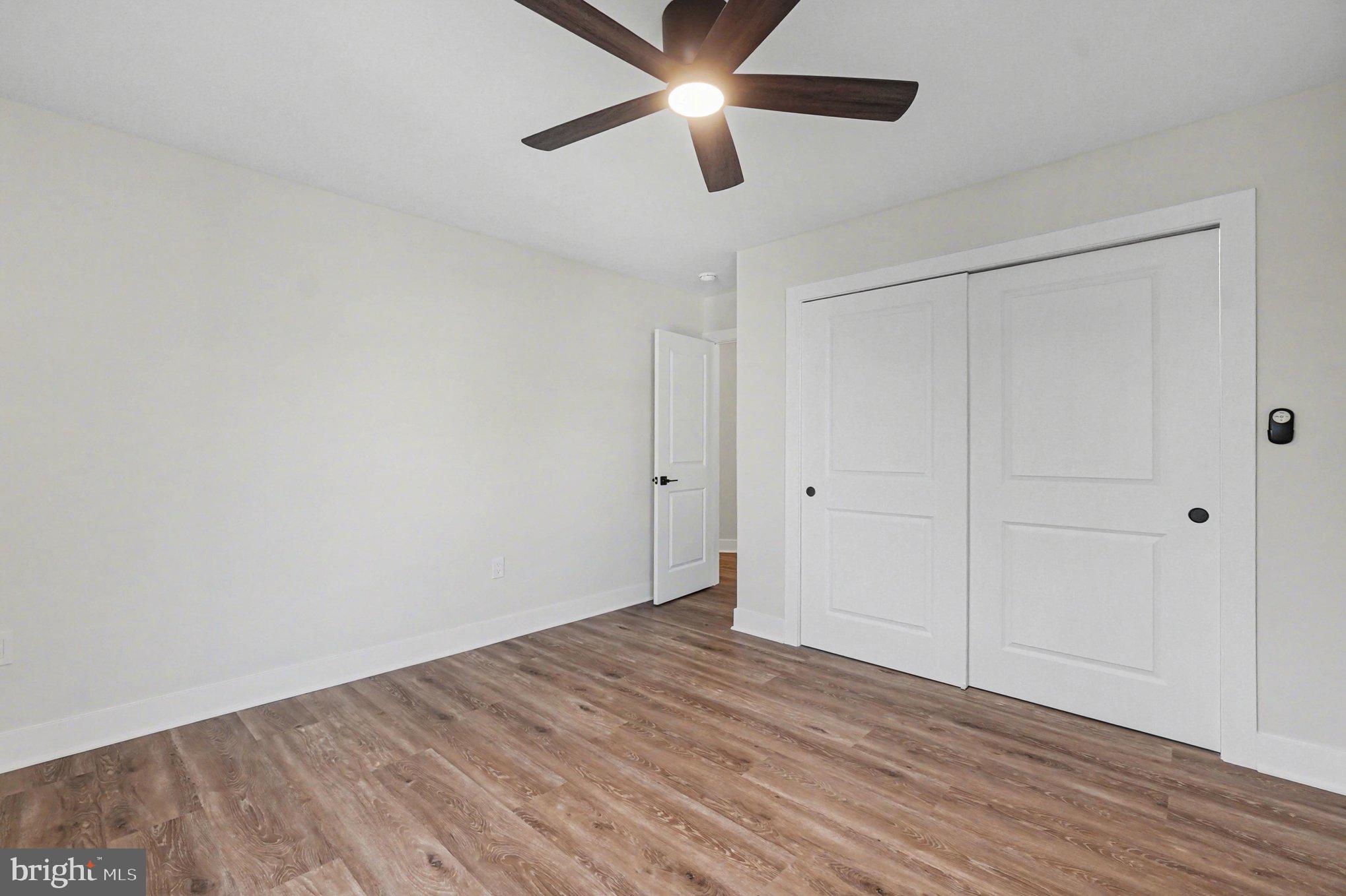 9108 Hinton Avenue Sparrows Point, MD 21219 - Photo 45 of 86 a view of empty room with wooden floor