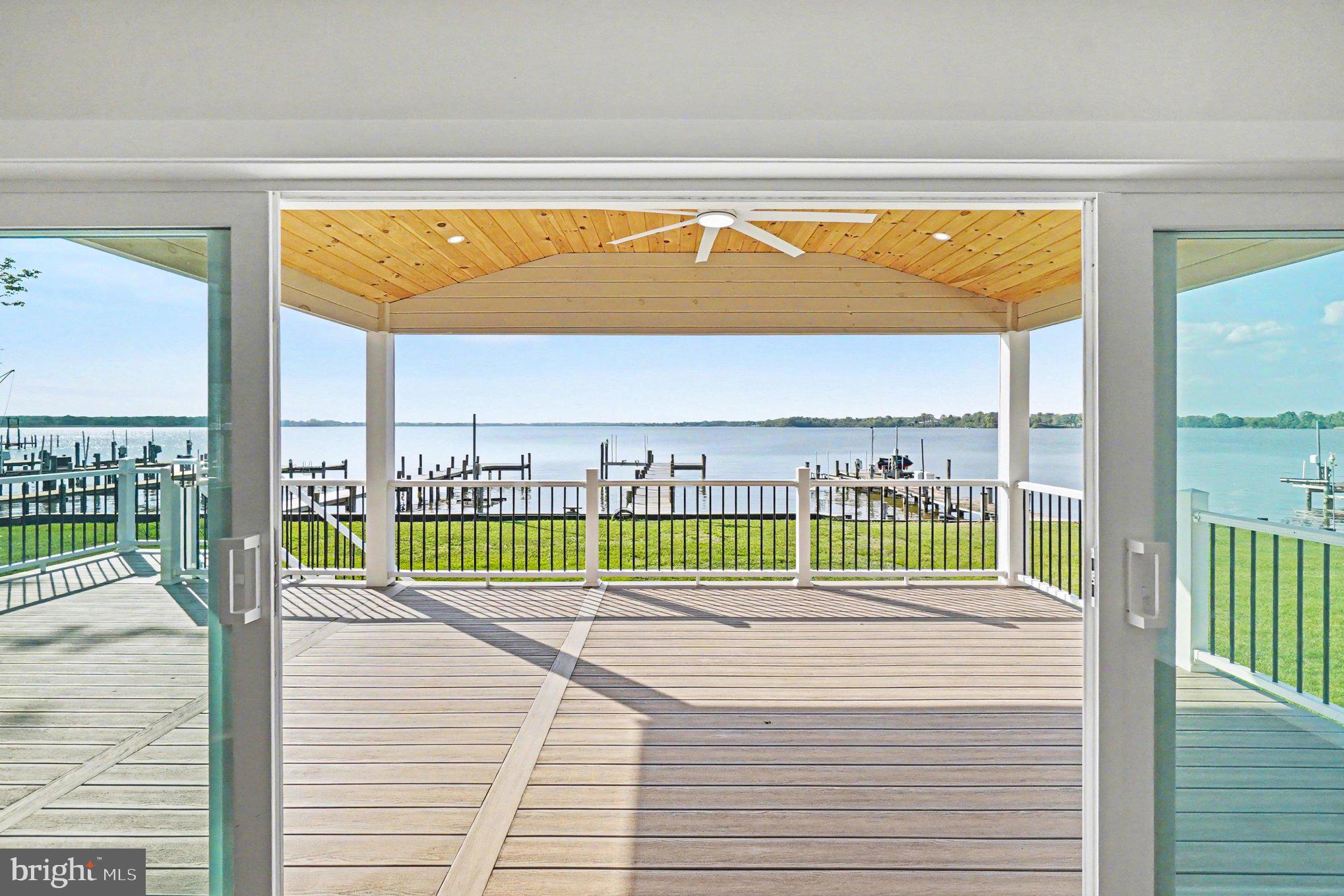 9108 Hinton Avenue Sparrows Point, MD 21219 - Photo 56 of 86 a view of a balcony and a floor to ceiling window in front of main door