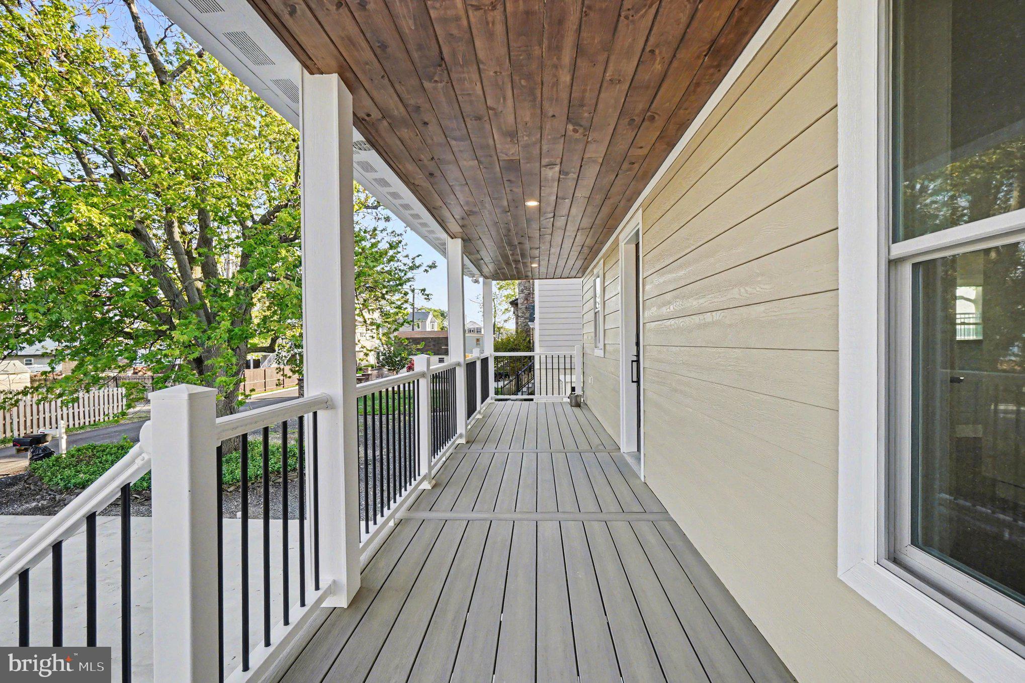 9108 Hinton Avenue Sparrows Point, MD 21219 - Photo 62 of 86 a view of a balcony with wooden floor