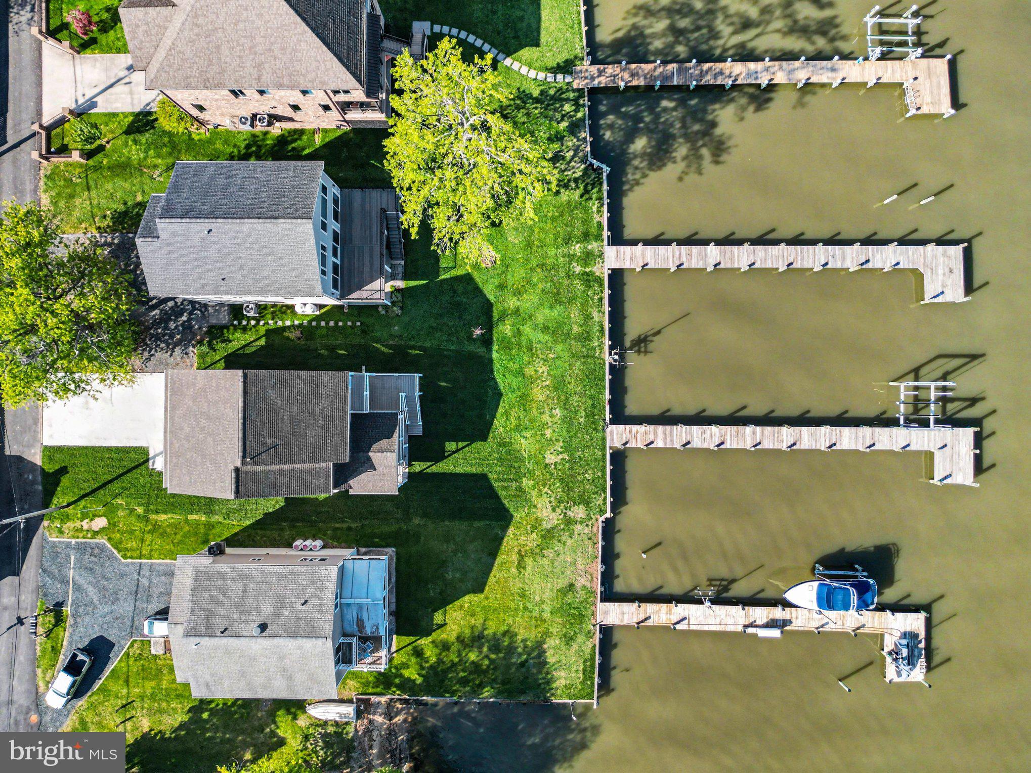 9108 Hinton Avenue Sparrows Point, MD 21219 - Photo 82 of 86 an aerial view of a house with a lake view