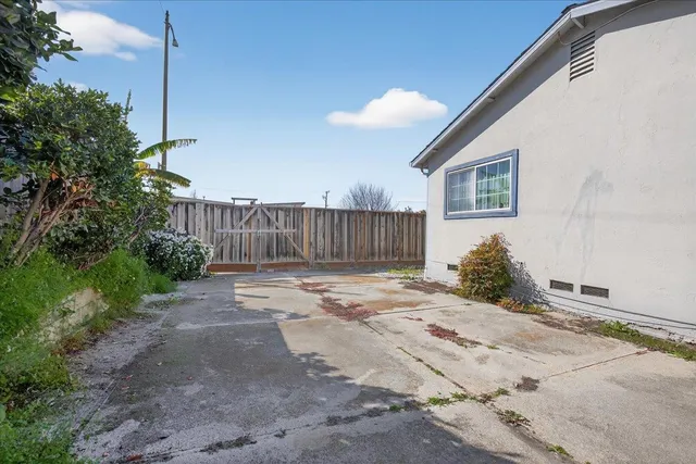a view of backyard with green space