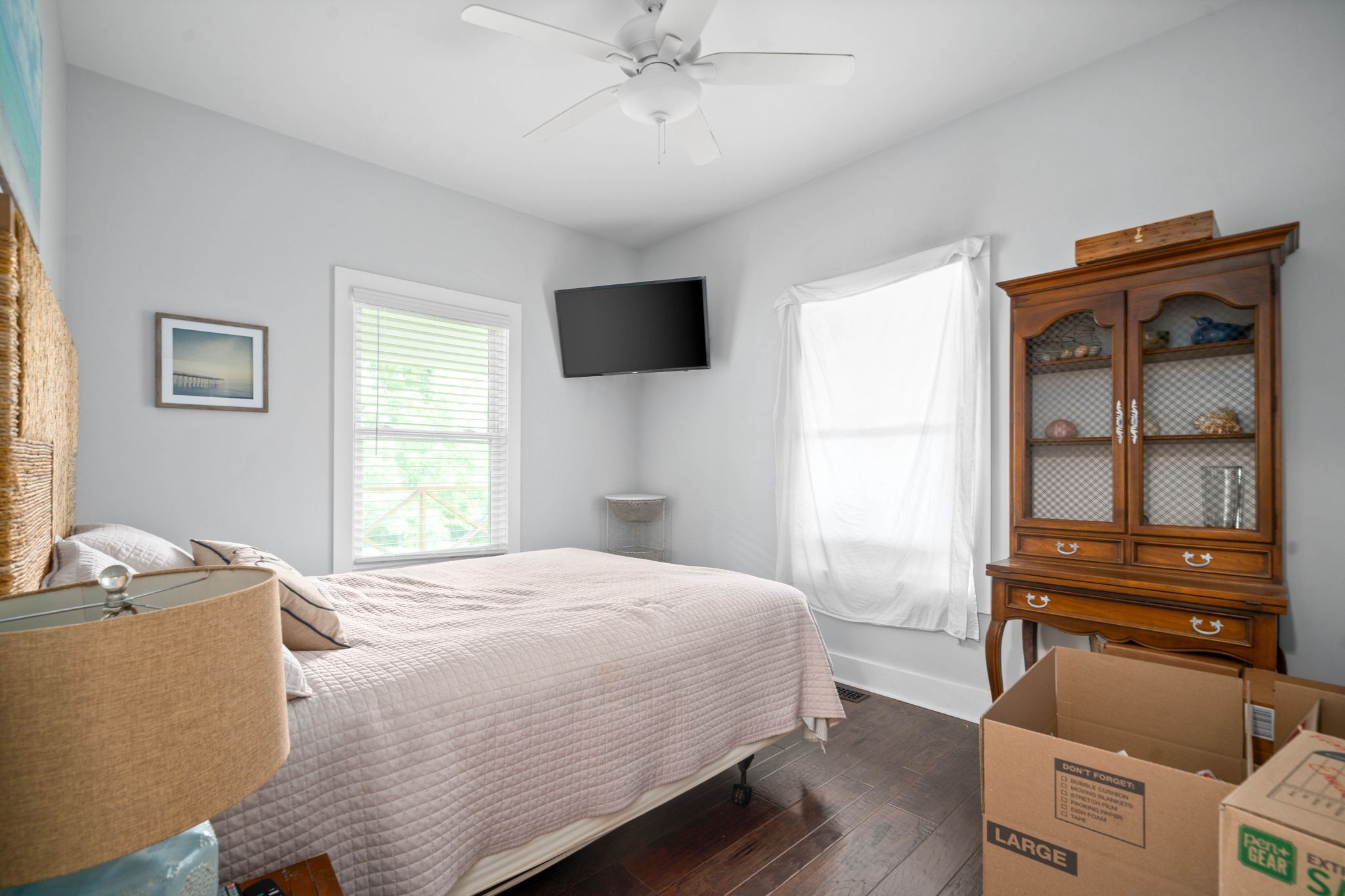 554 Hayes Ridge Road Indian Mound, TN 37079 - Photo 17 of 40 a bedroom with a bed and a flat tv screen on dresser