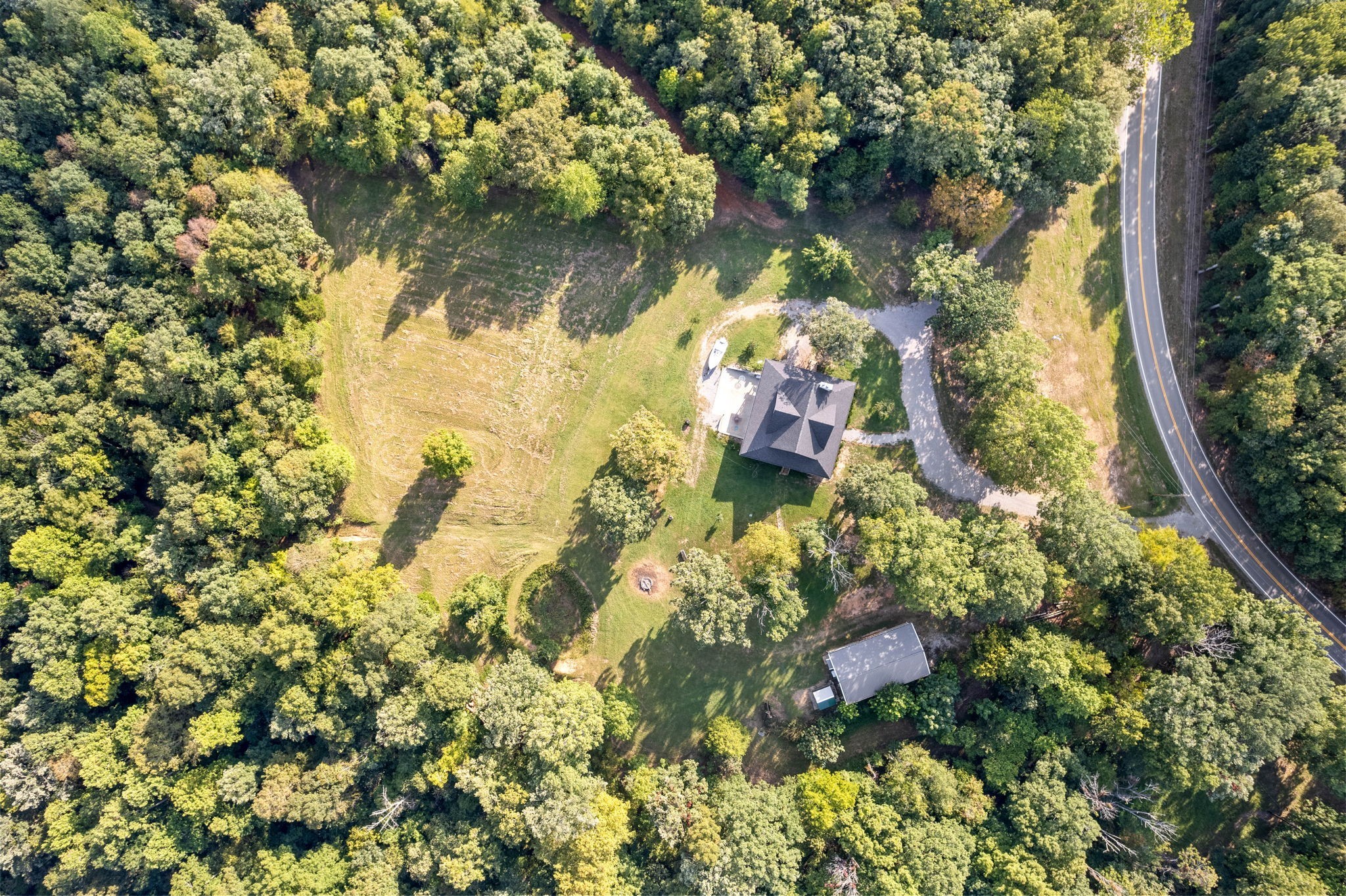 554 Hayes Ridge Road Indian Mound, TN 37079 - Photo 30 of 40 a view of a lake with a tree