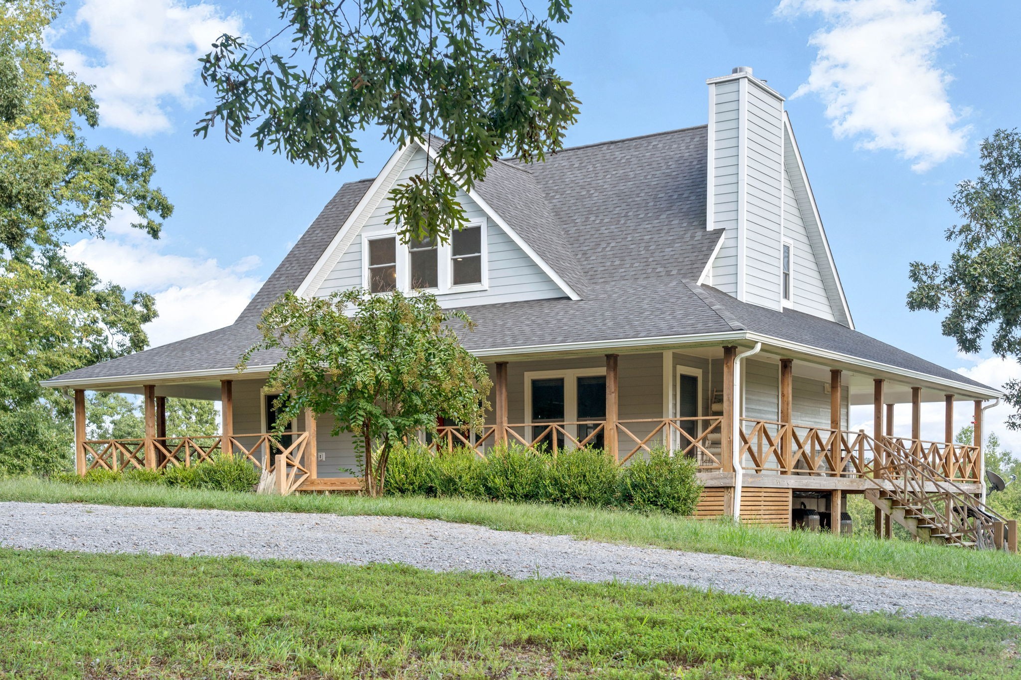 554 Hayes Ridge Road Indian Mound, TN 37079 - Photo 3 of 40 a front view of a house with a yard