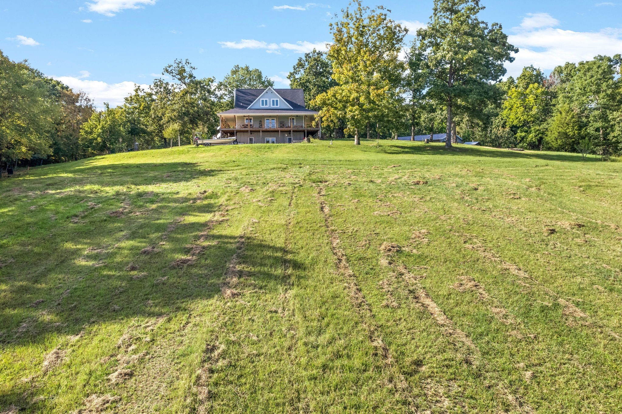 554 Hayes Ridge Road Indian Mound, TN 37079 - Photo 33 of 40 a view of a trees in a yard with a house