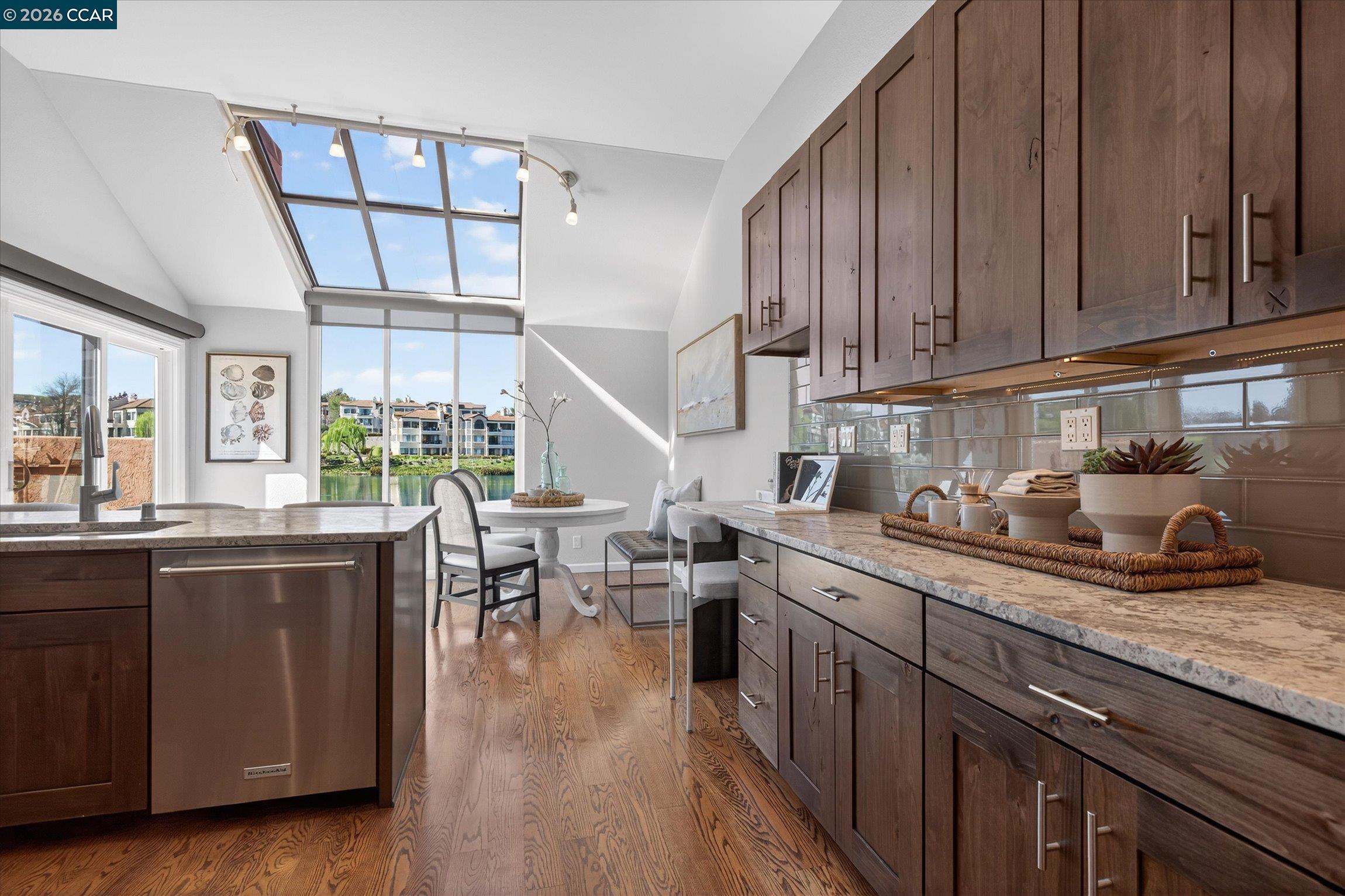 4059 West Lakeshore Drive San Ramon, CA 94582 - Photo 12 of 45 a kitchen with lots of counter top space and wooden floor