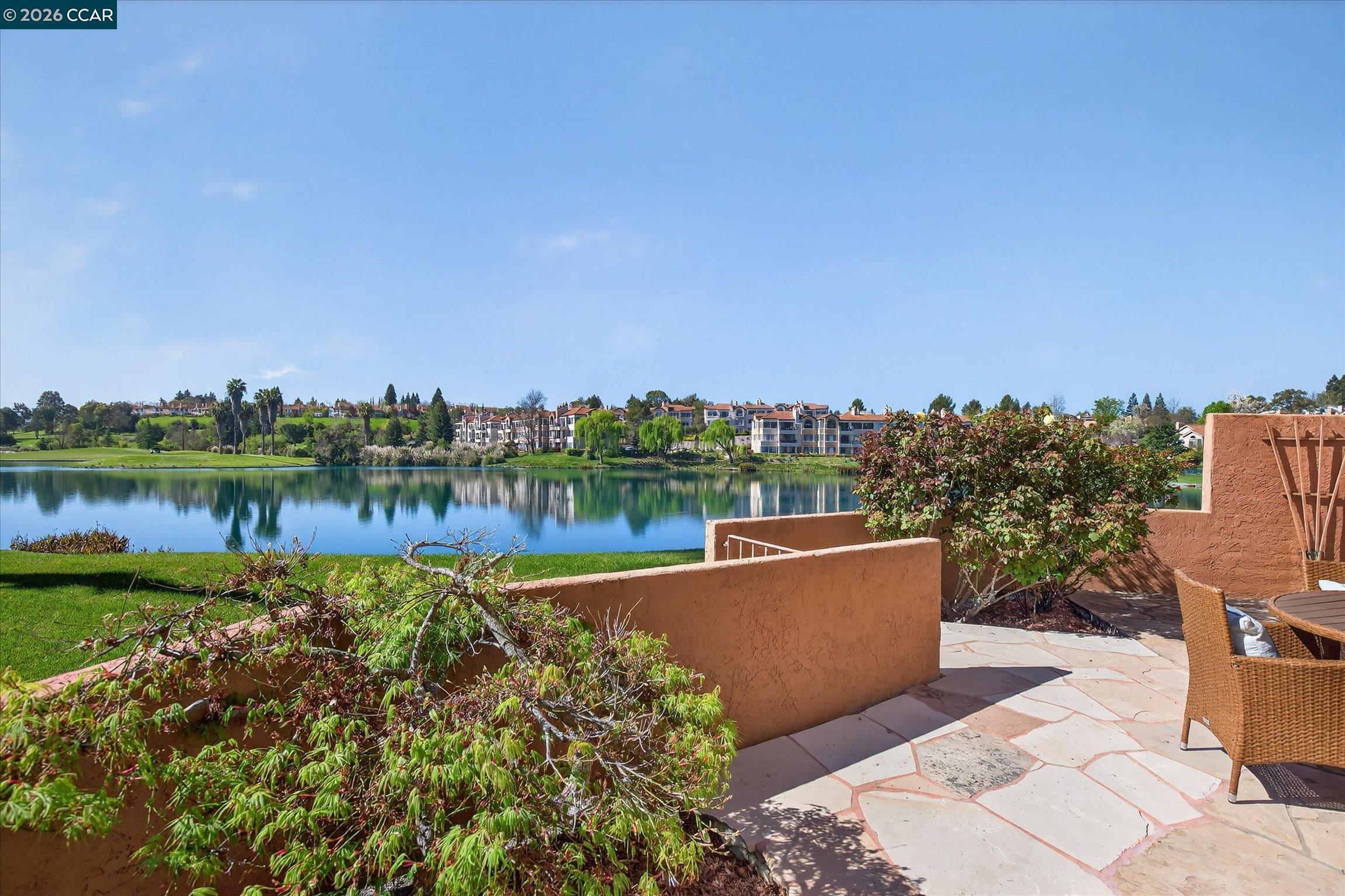 4059 West Lakeshore Drive San Ramon, CA 94582 - Photo 15 of 45 a view of a lake with a building in the back