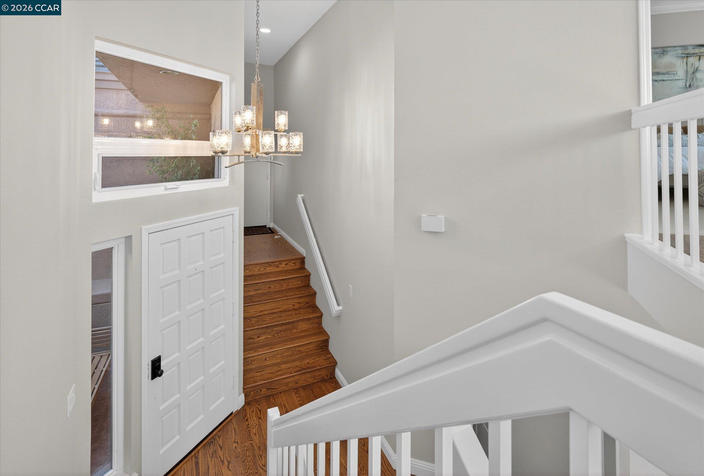 4059 West Lakeshore Drive San Ramon, CA 94582 - Photo 22 of 45 a view of a livingroom with wooden floor and stairs