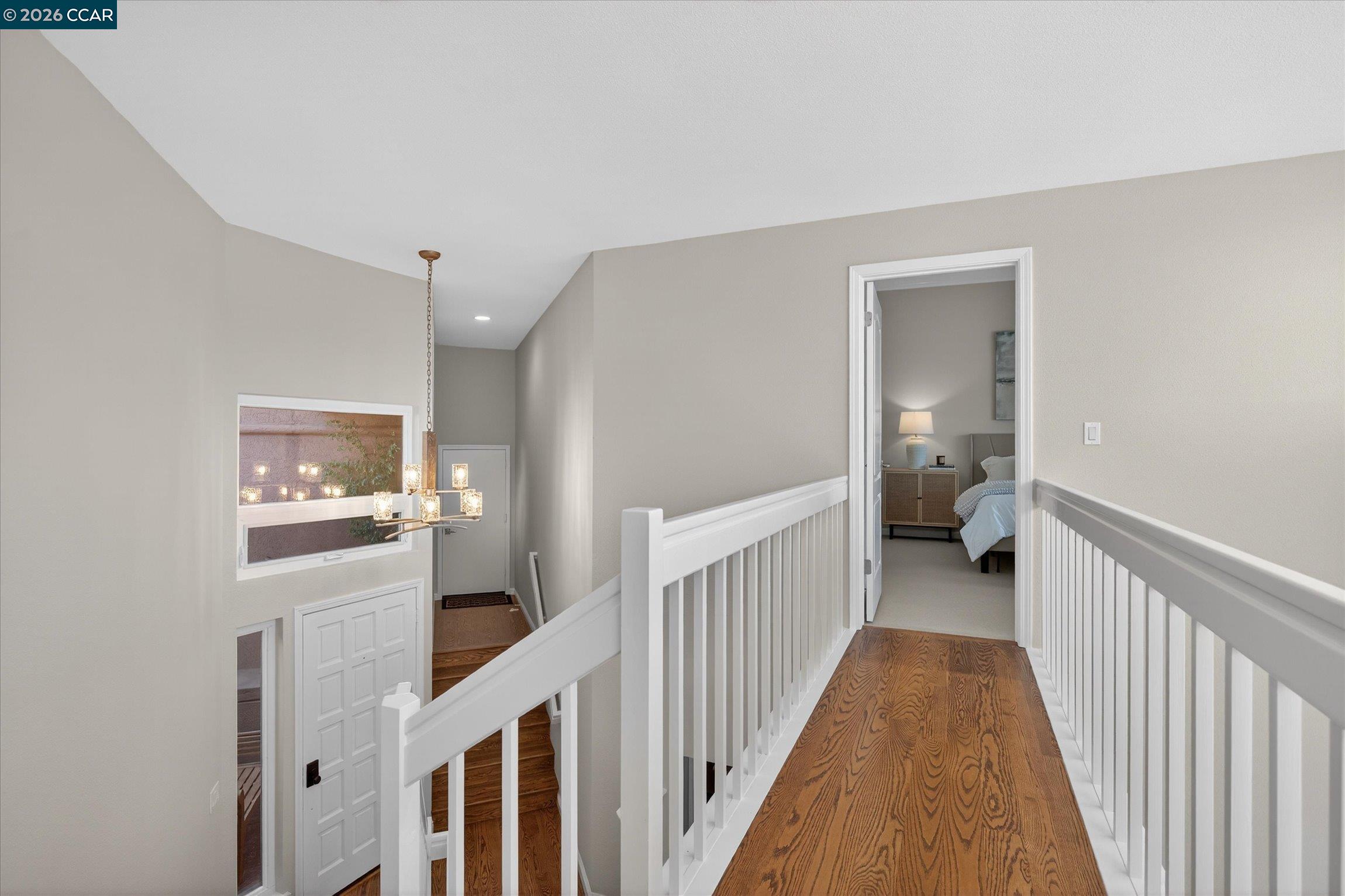 4059 West Lakeshore Drive San Ramon, CA 94582 - Photo 23 of 45 a view of a hallway with a bedroom