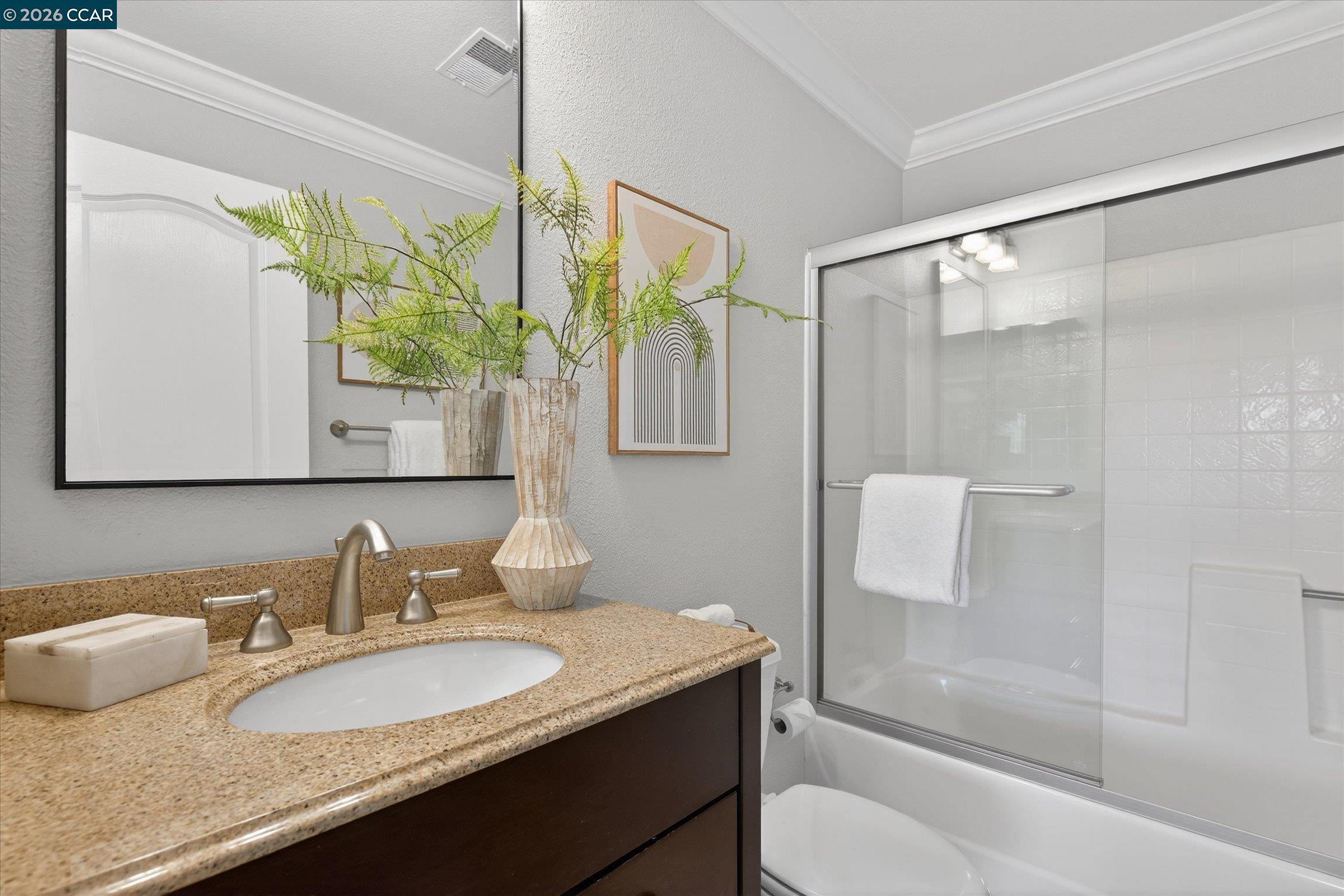 4059 West Lakeshore Drive San Ramon, CA 94582 - Photo 34 of 45 a bathroom with a granite countertop sink toilet and shower