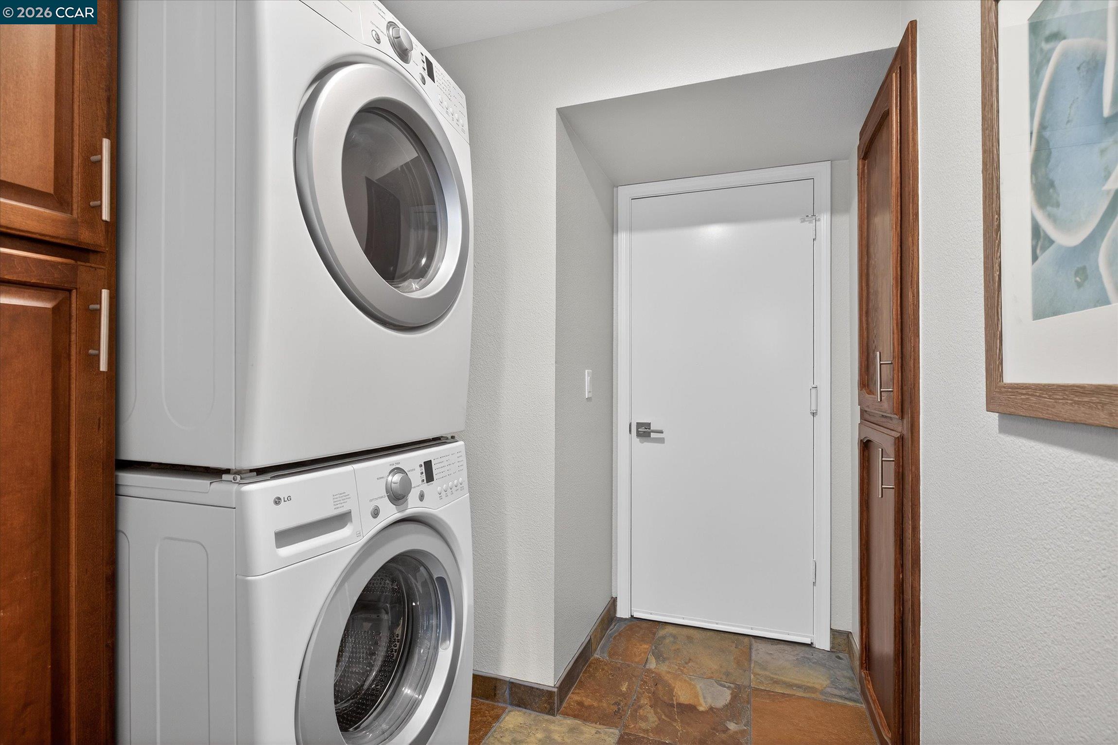 4059 West Lakeshore Drive San Ramon, CA 94582 - Photo 35 of 45 a view of a storage & utility room with washer and dryer