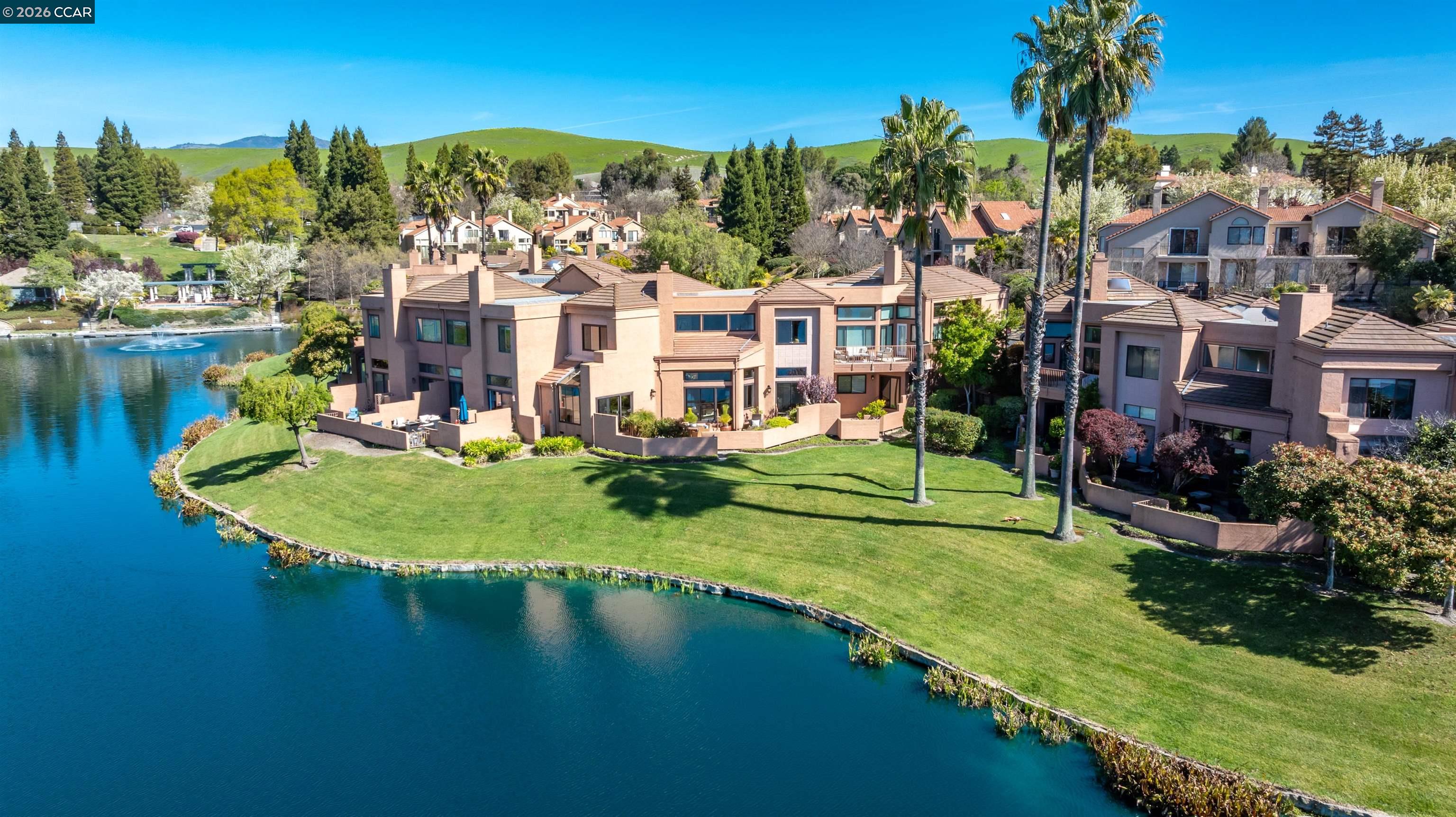 4059 West Lakeshore Drive San Ramon, CA 94582 - Photo 4 of 45 an aerial view of a house with a garden and lake view
