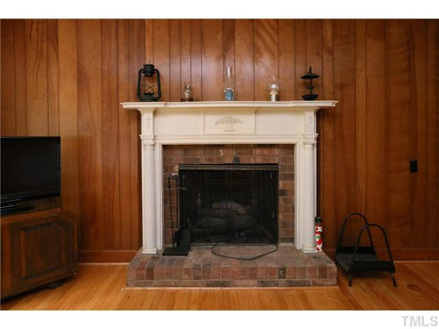 1217 Shelley Road Raleigh, NC 27609 - Photo 8 of 24 Family room fireplace