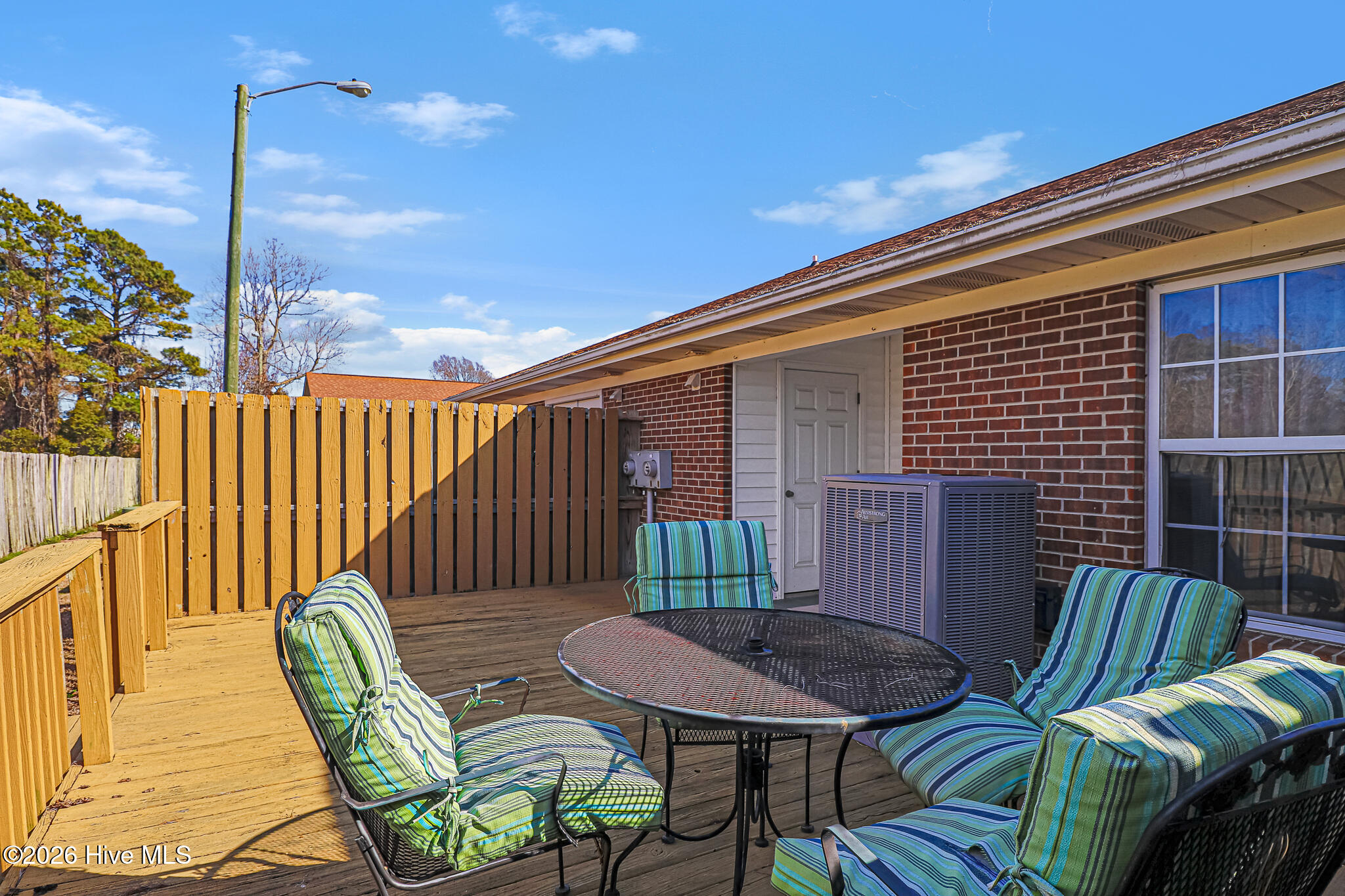 2900 Myrtle Street, Unit 11 ROSEWOOD VILLAGE Morehead City, NC 28557 - Photo 21 of 27 Back Deck & Storage Room