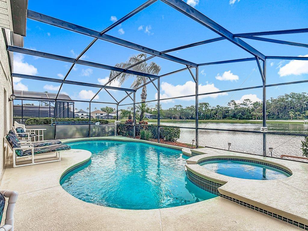 955 Lake Berkley Drive Kissimmee, FL 34746 - Photo 39 of 57 a view of a swimming pool with a patio