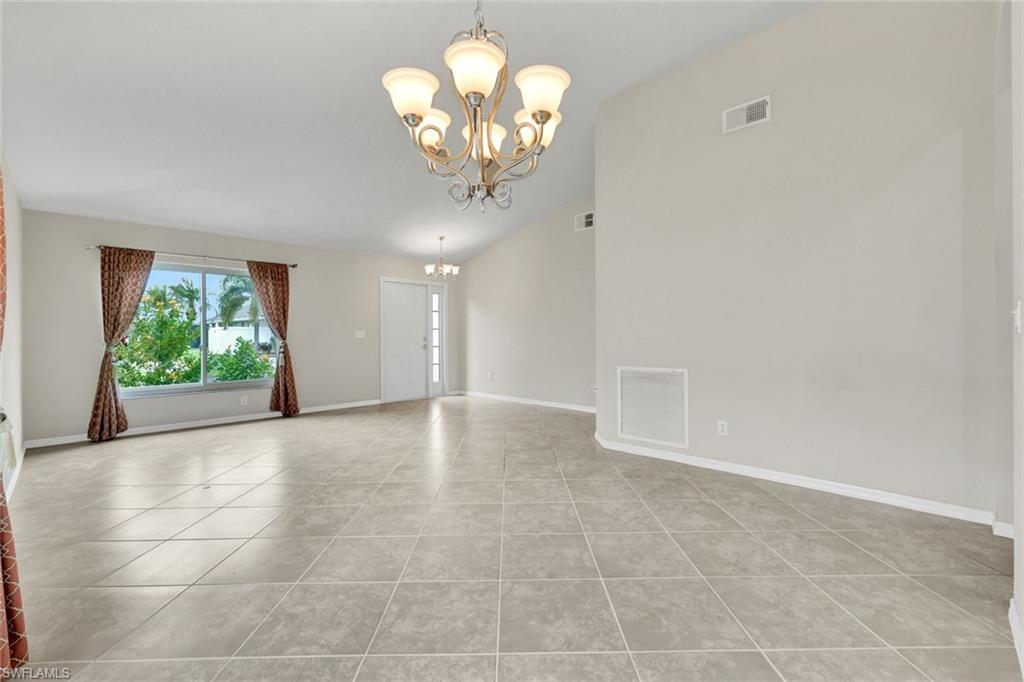 15645 Beachcomber Avenue Fort Myers, FL 33908 - Photo 21 of 33 a view of a chandelier in a room