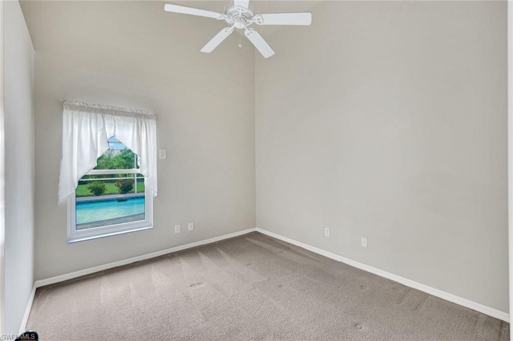 15645 Beachcomber Avenue Fort Myers, FL 33908 - Photo 23 of 33 an empty room with a window