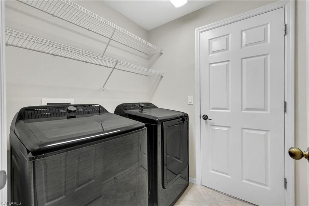 15645 Beachcomber Avenue Fort Myers, FL 33908 - Photo 26 of 33 a utility room with dryer and washer