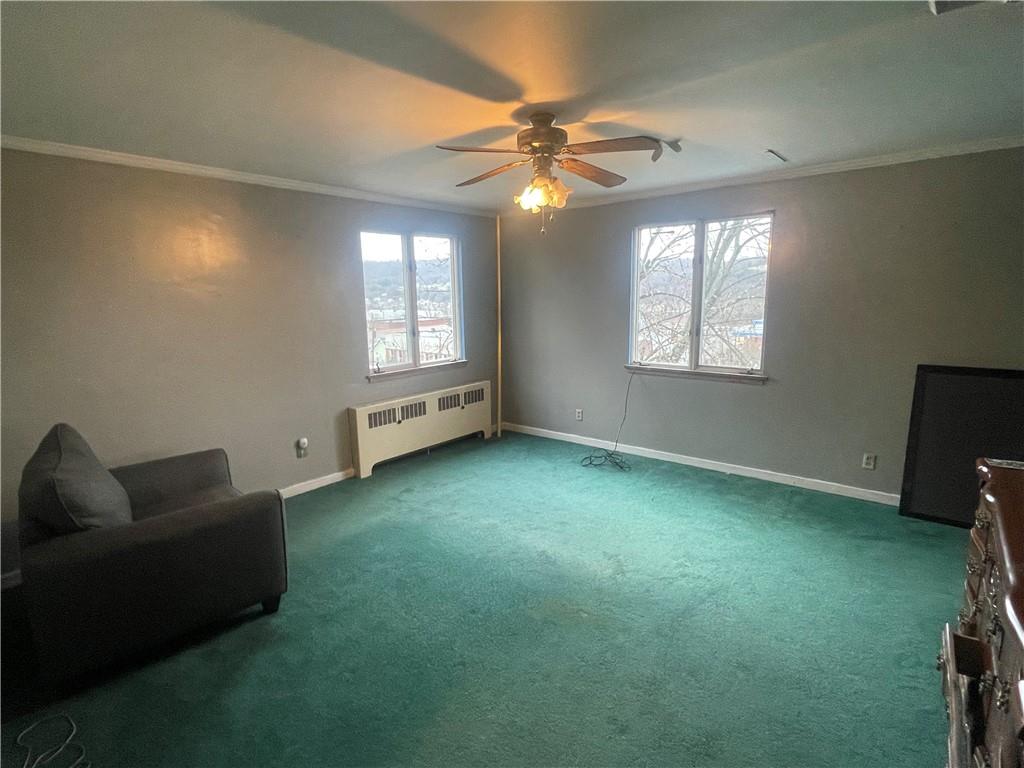 701 Thompson Avenue Donora, PA 15033 - Photo 22 of 36 a view of livingroom with furniture and windows
