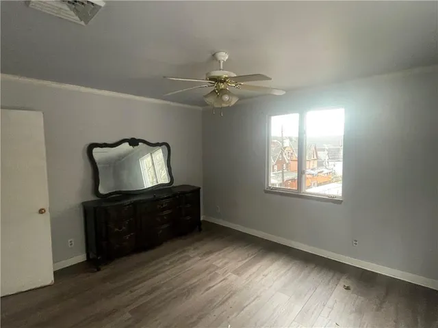 view of living room with furniture and a refrigerator