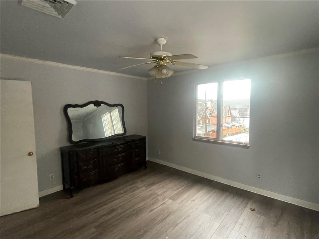 701 Thompson Avenue Donora, PA 15033 - Photo 25 of 36 a living room with furniture and a dresser