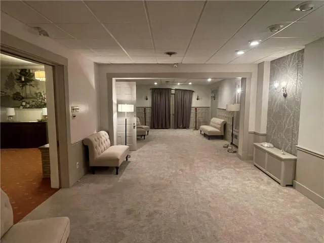 a view of a hallway with workspace