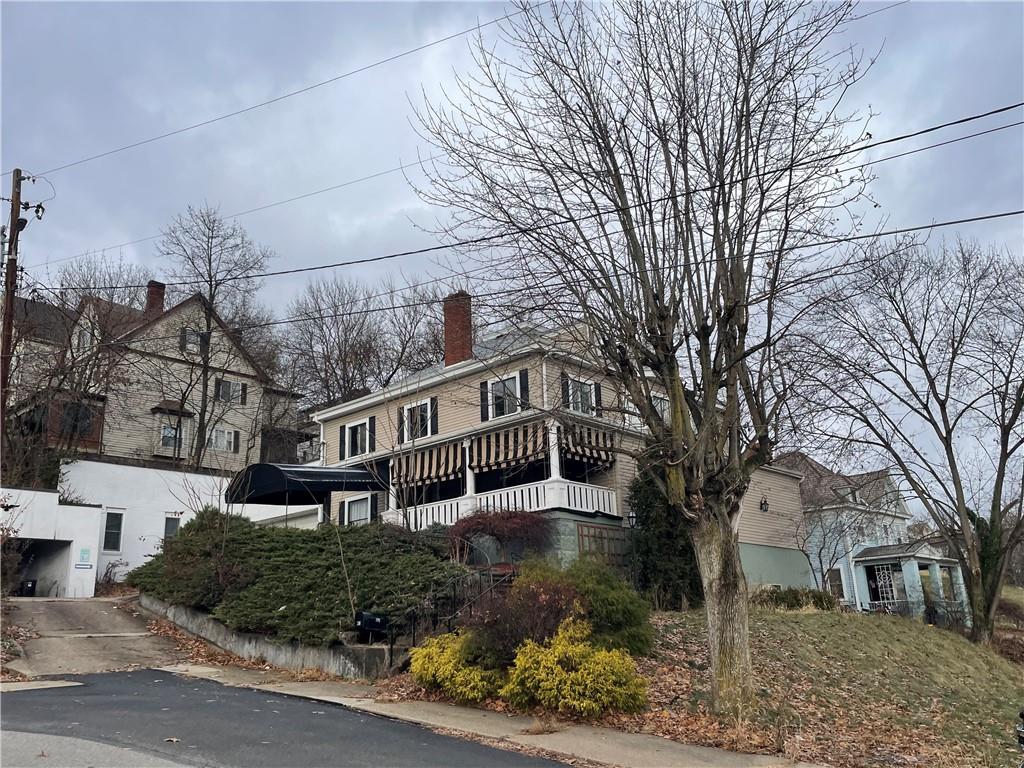 701 Thompson Avenue Donora, PA 15033 - Photo 4 of 36 a house that has tree in front of it