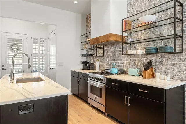 a kitchen with a sink and cabinets