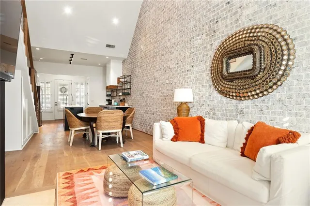a living room with furniture and a rug