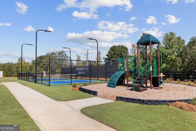 a view of a park with swings