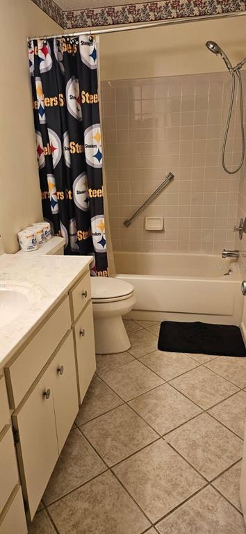 8666 Southwest 92nd Lane, Unit F Ocala, FL 34481 - Photo 11 of 12 a bathroom with a bathtub sink and toilet