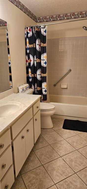 8666 Southwest 92nd Lane, Unit F Ocala, FL 34481 - Photo 9 of 12 a bathroom with a bathtub sink and toilet