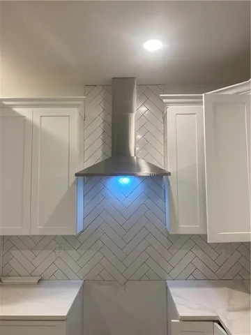 a view of room with wooden floor and window