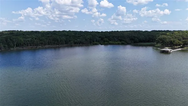 a view of a lake from a yard