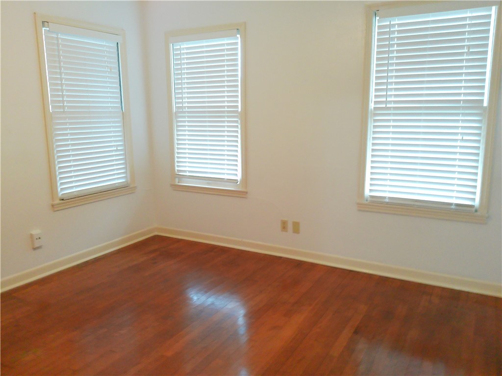 1017 Sorrell Street Corpus Christi, TX 78404 - Photo 10 of 16 an empty room with a window