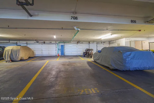 a hall with a car parked