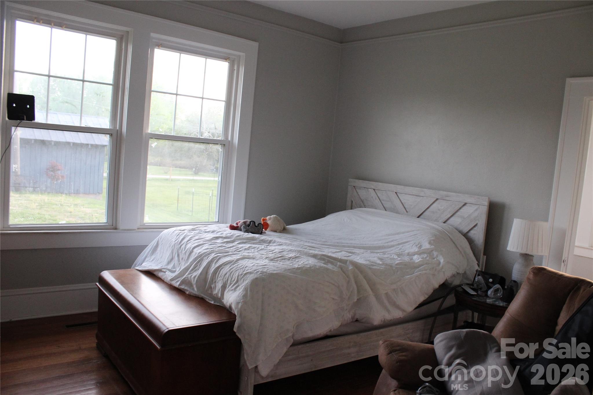 300 Banner Farm Road Mills River, NC 28759 - Photo 16 of 21 a bedroom with a bed and a window