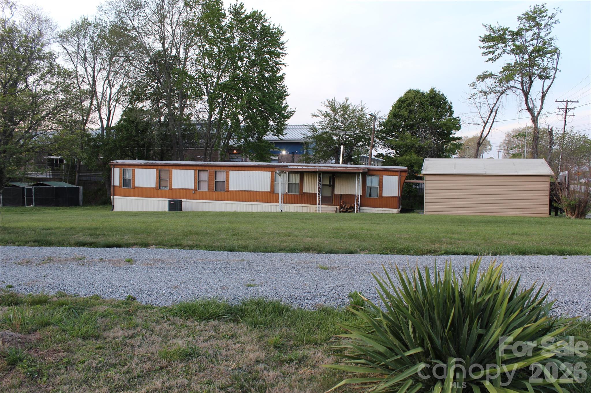 300 Banner Farm Road Mills River, NC 28759 - Photo 21 of 21 a front view of a house with a garden